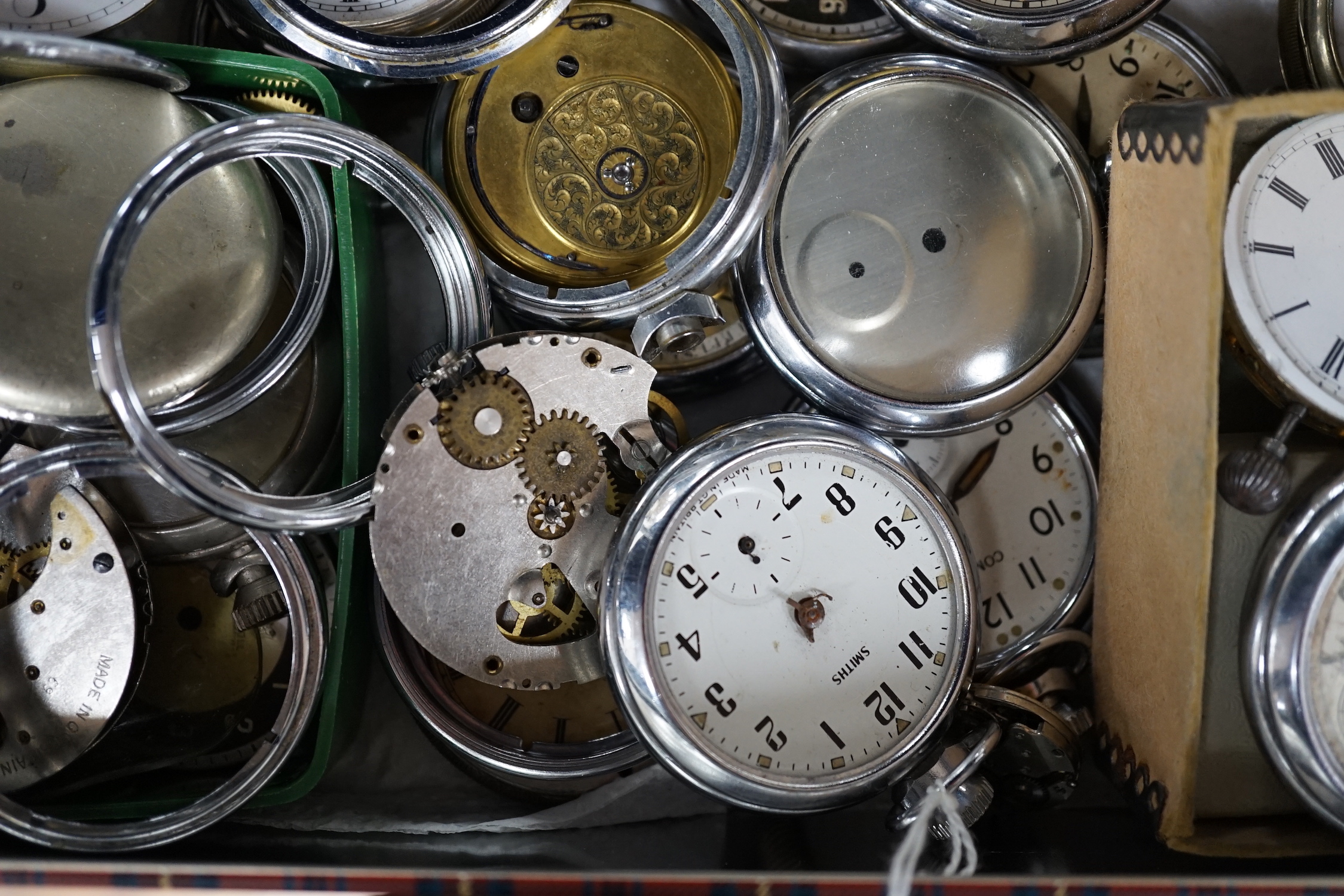 A quantity of assorted watch parts, movements, including Ingersoll, Smiths, Leonidas, etc.